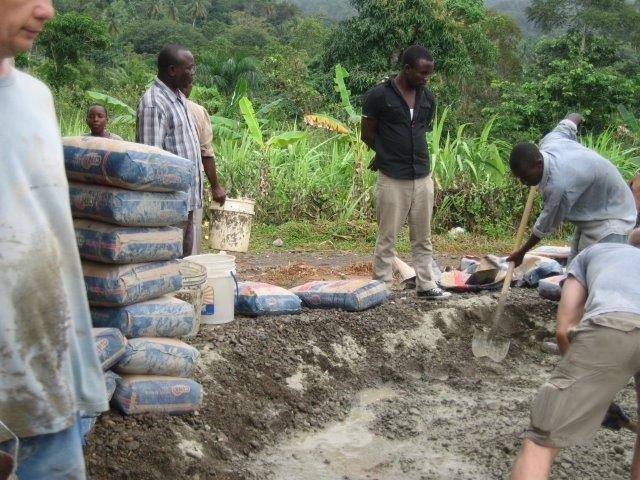 Mixing concrete for the church floor in Pilote