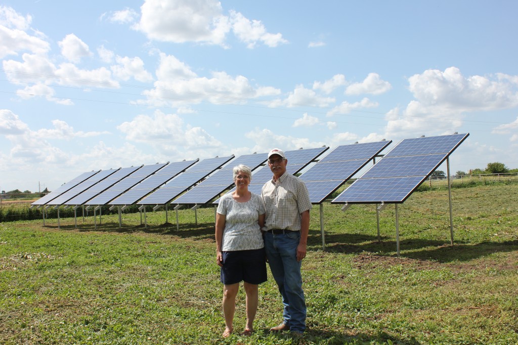Mark Epp Cathy Wismer in front of solar panels (4)