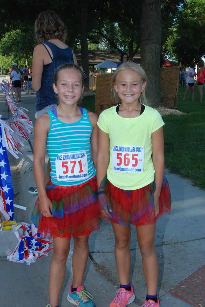 Mariah Tessman and Hayden Mierau crossed the finish line together to tie for 3rd place in the girls Under 15 division of the 5k. They also got runner-up prizes in the super hero costume division.